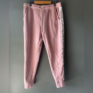 Royal Caribbean, size Large, pink cotton sweatpants, “travel more see more”